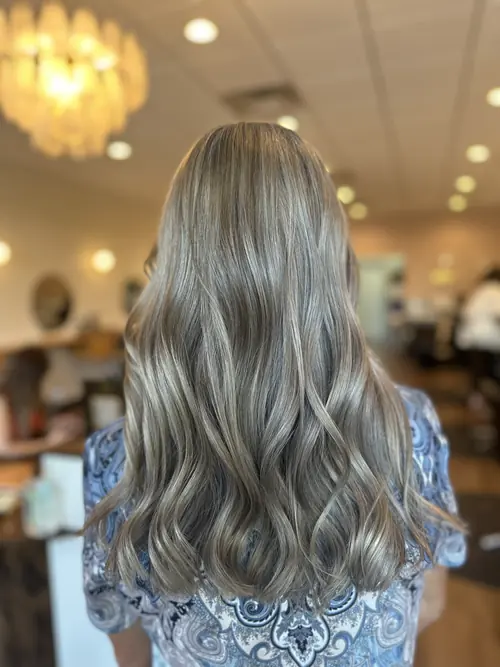 Ash beige blonde with soft waves on long hair, coloured at Ash and Ivy organic salon in Evans, GA