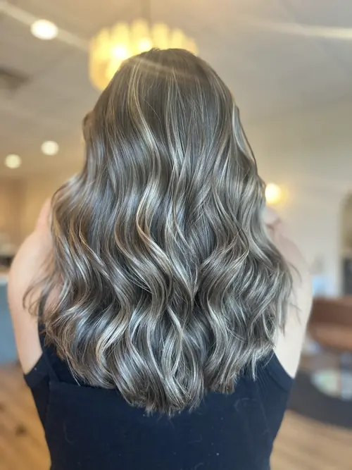 Smoky ash brown colour with loose waves on shoulder-length hair at Ash and Ivy Salon in Evans, GA